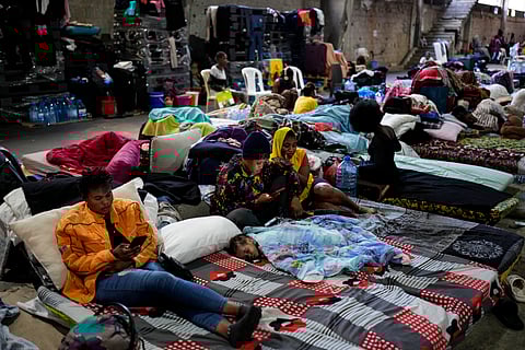 Female Sierra Leonean migrant workers stranded in Lebanon, wait to be repatriated back home, as they are sheltered at a former car dealership shop that was turned into a shelter in Hazmieh, east of Beirut.