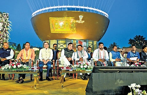 Majhi along with Assam CM Himanta Biswa Sarma, DBG MD Puneet Dalmia and others after inauguration of the Badminton HPC on Thursday.