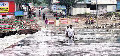 Overflowing water due to downpour have submerged Padikuppam bridge in  Chennai