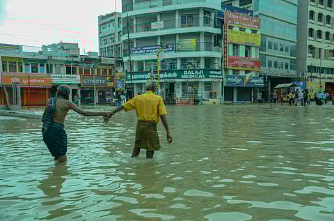 Flood water stagnation in Tirunelveli Junction bus stand road.