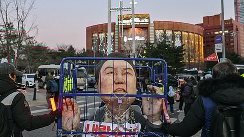 An effigy of South Korean President Yoon Suk Yeol is seen during a protest following the result of the second martial law impeachment vote outside the National Assembly in Seoul on Saturday.
