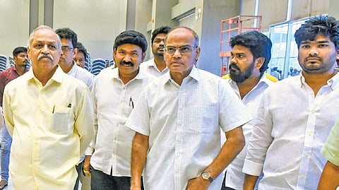 NTR Literature Committee members inspect arrangements 