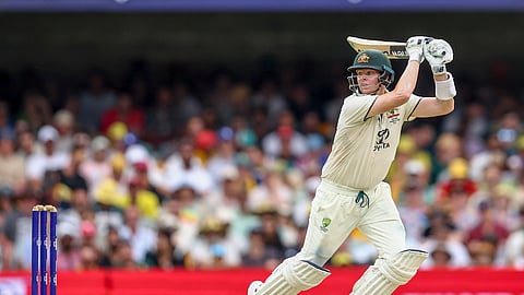 Australia's Steve Smith bats during play on day two of the third cricket test between India and Australia at the Gabba in Brisbane, Australia.