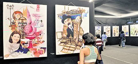 Delegates view the digital painting exhibition ‘Cinema Alchemy’ held as part of 29th IFFK on Tagore Theatre premises on Sunday
