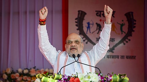 Union Home Minister Amit Shah addresses the gathering during the closing ceremony of 'Bastar Olympics' at Jagdalpur, in Bastar district, Chhattisgarh, Sunday, Dec. 15