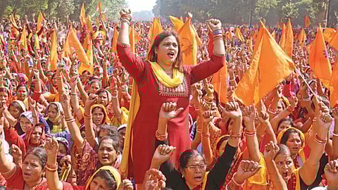Anganwadi workers protesting at PMG road on Monday.
