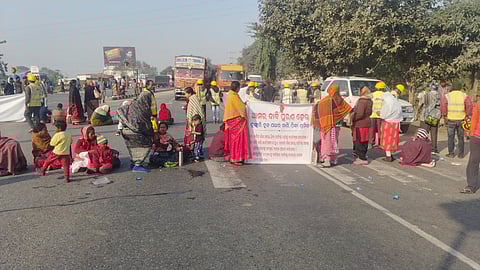 Workers of Dunguri Limestone Mines blocking the NH near Haldipali.