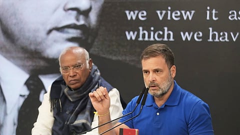 Congress president Mallikarjun Kharge and Rahul Gandhi addresses a press conference at AICC in New Delhi on Thursday.