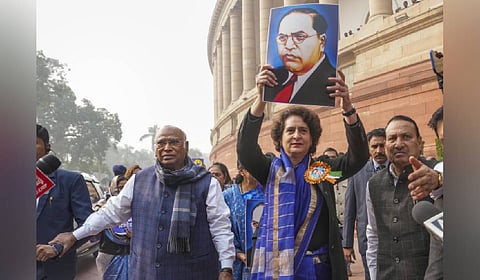 LoP in the Rajya Sabha and Congress President Mallikarjun Kharge with party MP Priyanka Gandhi Vadra and other INDIA bloc members during a protest in Parliament premises demanding the resignation of Home Minister Amit Shah for his remarks related to B R Ambedkar.