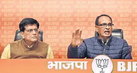 Union Ministers Shivraj Singh Chouhan and Piyush Goyal address a press meet at BJP headquarters in New Delhi on Thursday.