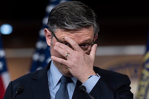 Speaker of the House Mike Johnson, R-La., takes questions from reporters after presenting his final version of an interim pending bill to his caucus, at the Capitol in Washington on Tuesday.