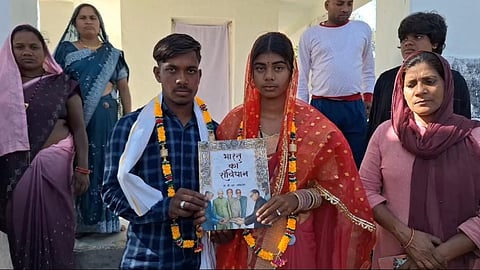 Constitutionally bound: Couple marries by taking oath on Preamble, circling Ambedkar's photo