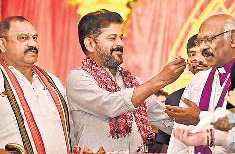 Chief Minister A Revanth Reddy and TPCC chief B Mahesh Kumar Goud take part in the Christmas celebrations organised by the government at LB Stadium in Hyderabad