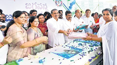 YSRCP activists celebrate the birthday of party president YS Jagan Mohan Reddy at the party headquarters on Saturday