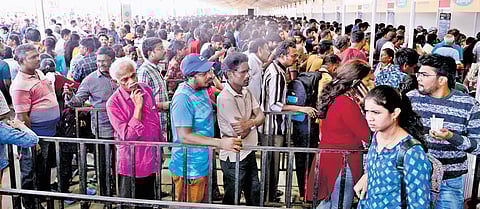 Long queues at the payment counter to buy prepaid cards