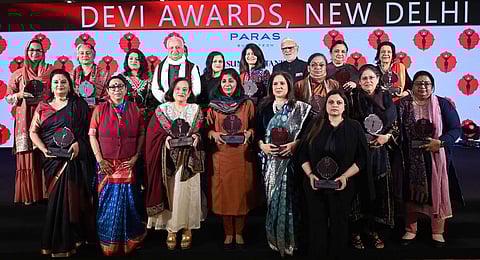 Chief guest and Kerala Governor Arif Mohammed Khan (4th from left in second row), TNIE Group Editorial Director Prabhu Chawla (7th from left in second row) and Editor Santwana Bhattacharya (2nd from the left in first row) with awardees on Monday. Seventeen women were recognised for their achievements in their fields.