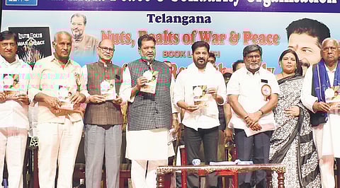 Chief Minister A Revanth Reddy releases “Nuts, Bolts of War & Peace”, a book authored by former MLC K Yadava Reddy, at Ravindra Bharati on Tuesday