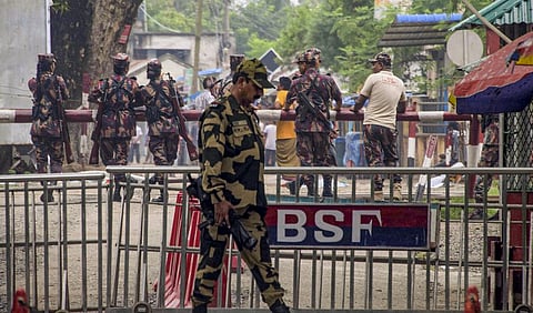 A Border Security Force  guard is seen at the India-Bangladesh border checkpost at Hili in Dakshin Dinajpur district.