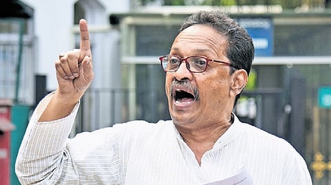 Activist TJ Abraham speaks to the media after submitting a memorandum to the governor on Tuesday