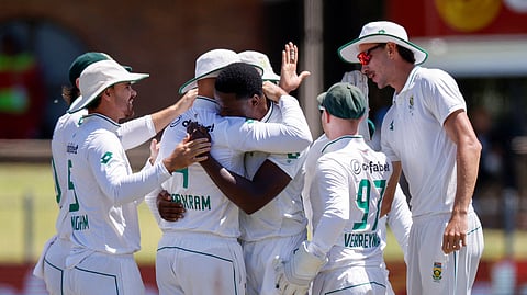 Kagiso Rabada (C) celebrates with teammates during the fifth day of the second international Test cricket match between South Africa and Sri Lanka at St Georges Park in Gqeberha on December 9, 2024.
