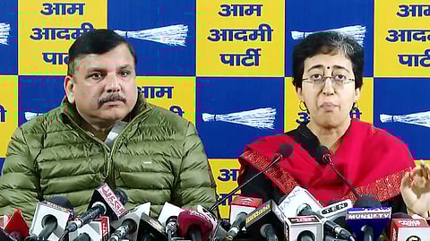 Delhi Chief Minister Atishi (R) and AAP Rajya Sabha MP Sanjay Singh (L) 