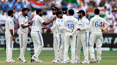 Jasprit Bumrah celebrates with his teammates the wicket of Usman Khawaja in Day 1 of the fourth test in Melbourne.