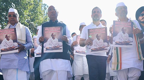 AICC President Mallikarjun Kharge, Congress leader Rahul Gandhi, Karnataka CM Siddaramaiah, and Deputy CM DK Shivakumar march to the venue of the extended CWC meeting in Belagavi on Dec. 26, 2024.