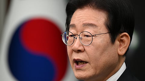 South Korea's main opposition Democratic Party leader Lee Jae-myung delivers a public statement on the impeachment motion against acting president Han Duck-soo at the National Assembly in Seoul on December 27, 2024. 