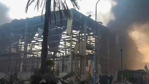 A grab from footage released by Yemen's Huthi Ansarullah Media Center on December 26, 2024, reportedly shows smoke billowing after Israeli strikes on the Ras Kutaib power station in Hodeida. 