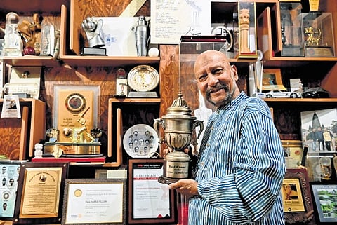 Syed Kirmani shows his display of several awards he has been honoured with over the years.