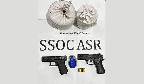 1.4 kg heroin, one hand grenade and two sophisticated pistols -- one 9MM Zigana and one 9MM Glock -- along with ammunition were recovered from their possession. 

