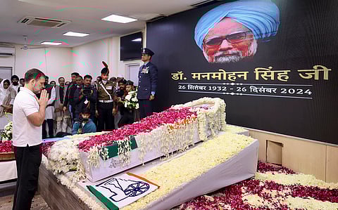 Congress leader Rahul Gandhi pays last respects to former prime minister Manmohan Singh, at AICC headquarters in New Delhi, Saturday, Dec. 28, 2024.