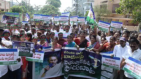 YSRCP Party Leaders and Workers stage a protest against increasing of electricity bills at Gurudwara in Visakhapatnam on Friday.