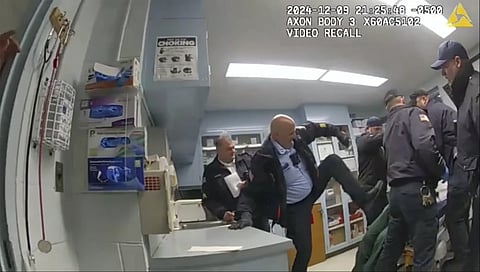 This image provided by the New York State Attorney General office shows bodycam footage of correction officers beating a handcuffed man, Robert Brooks, 43,  at the Marcy Correctional Facility in Oneida County, N.Y on Dec 9, 2024.