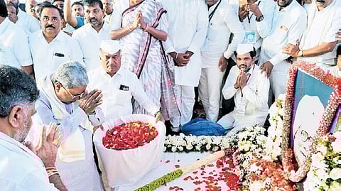 Chief Minister Siddaramaiah and DCM DK Shivakumar pay tributes to former PM Manmohan Singh in Belagavi on Friday 