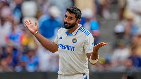 India's Jasprit Bumrah celebrates a wicket during play on the first day of the fourth cricket test between Australia and India at the Melbourne Cricket Ground, Melbourne.