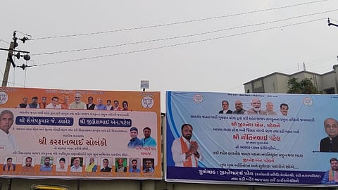 Banners put up by the two factions in Kadi, Mehsana district of Gujarat.