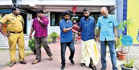 GCDA chairman K Chandran PIllai with officials outside JLN Stadium in Kochi after inspection on Monday.