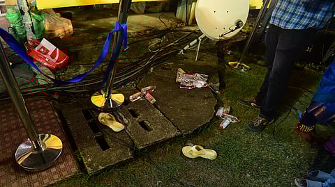 The blood stained footwear lying below the dais at the Jawaharlal Nehru International Stadium, Kaloor. Uma Thomas, MLA, fell from a 15-ft height from the dais.