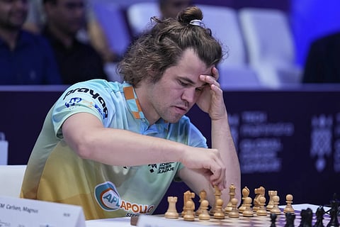 Norwegian Magnus Carlsen of SG Alpine Warriors plays against Poland's Jan-Krzysztof Duda of Chingari Gulf Titans during Global Chess League, July 1, 2023, in Dubai.