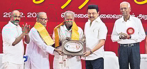 Chief Minister Stalin presenting CPI leader R Nallakannu with a memento during an event celebrating his centenary in Chennai on Sunday