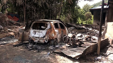 Charred remains of the vehicles after the drone bombing that occurred at Koutruk Village recently, in Imphal West on Monday, Sept. 9, 2024