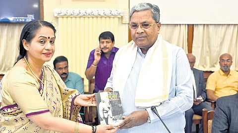 Chief Secretary Dr Shalini Rajneesh greets Chief Minister Siddaramaiah during a meeting at Vidhana Soudha in Bengaluru on Wednesday  