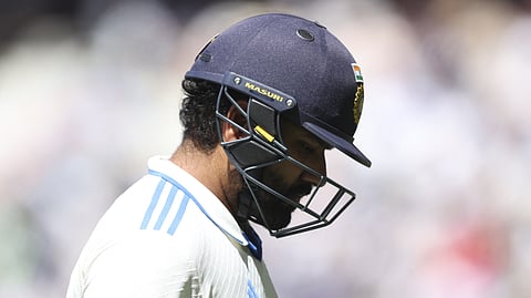 Rohit Sharma leaves the field after being dismissed on day five of the fourth cricket Test match between Australia and India at the Melbourne Cricket Ground (MCG) in Melbourne.