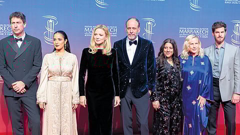Actor Andrew Garfield with jury members headed by Luca Guadagnino (centre) at the festival