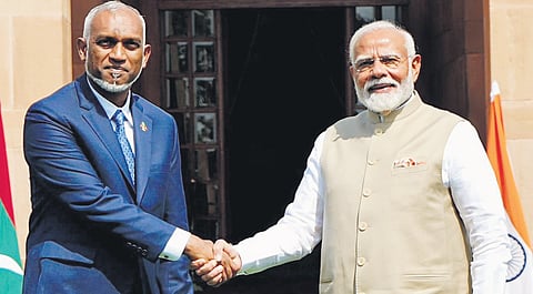 Maldives President Mohamed Muizzu with PM Narendra Modi in New Delhi last year 