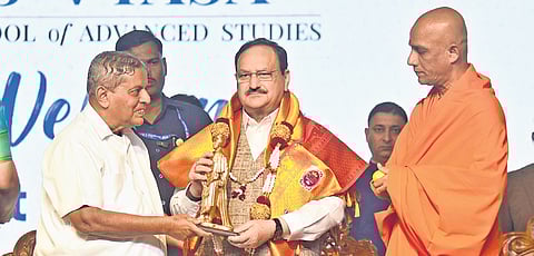 BJP national president JP Nadda being felicitated by Jagadguru Nirmalananda Swami, pontiff of Sri Adichunchanagiri Mutt, and Chancellor  of S Vyasa University  Dr HR Nagendra at a programme in Bengaluru on Friday