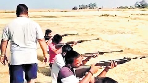 Participants at the weapons training camp said to be conducted by Sri Ram Sene at Todalabagi village in Jamkhandi taluk recently