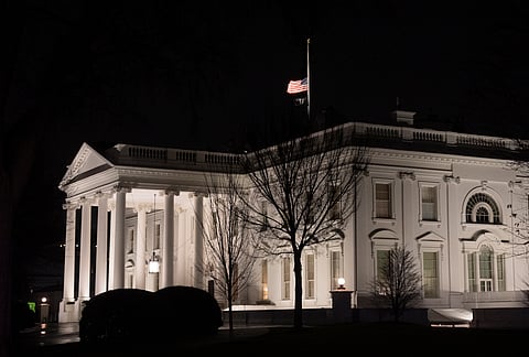 The flag flies at half-staff for the late President Jimmy Carter at the White House, Sunday, Dec. 29, 2024. 