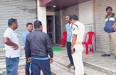 STF members questioning people near the jewellery shop on Sunday 